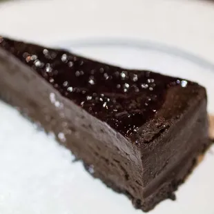 Dangerous Chocolate
 Fudgy dark chocolate cake, raspberry liqueur sauce