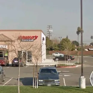 a parking lot with cars parked in it