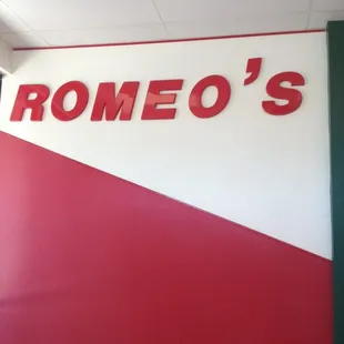 a red and white sign