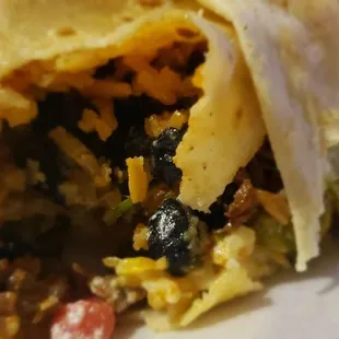 The firm black beans are genius from a texture aspect in the steak burrito