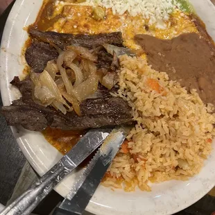 Enchiladas De Tomatillo with melt in your mouth steak