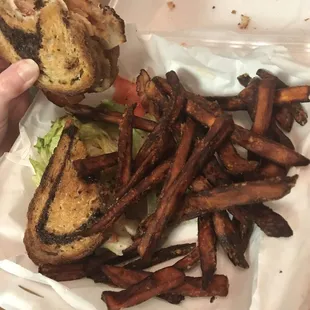 Extra burnt &amp; inedible Sweet potato fries that we paid extra for &amp; Turkey Melt with bread that was so hard it ended up in trash/