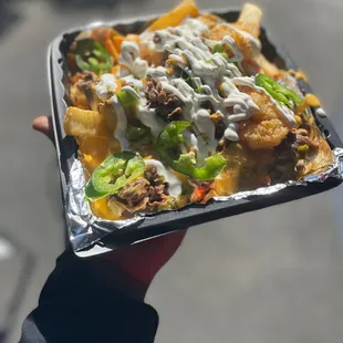 Loaded steak and prawn fries