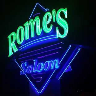 a neon sign for a restaurant