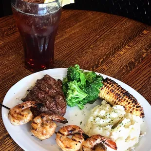 a plate of food and a drink