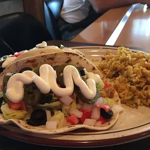 Taco with all the fixings and rice side