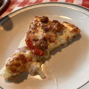 Bianca Pizza with sausage instead of chicken. Was phenomenal, crust was crunchy and cheese was gooey!