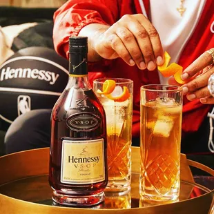 a man pouring a drink