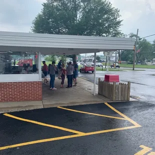 a group of people standing outside