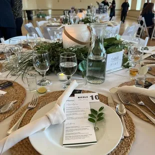 Rented linens, plates, cups, napkins, silverware, water pitchers