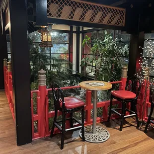 a table and chairs in a restaurant