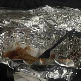 Foot long fish sub next to fries