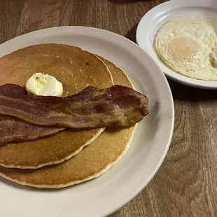 Short stack, bacon and two eggs over easy.