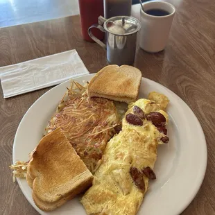Omelette with Basque sausage and cheese - sourdough toast and hash browns.  Great coffee too from the Bay Area - Peerless&apos; grind!  ;-)