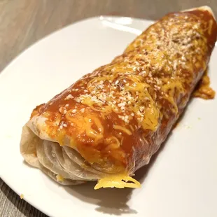 Bacon Breakfast Burrito (ordered a wet burrito for $3 extra). Comes with bacon, eggs, cheese, and potatoes.