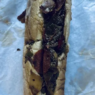 Large Steak and Cheese - Cooked Onion - Cooked Peppers  - Light Ketchup and Mayonnaise  - Pepperoni  - Becon  - Mushroom