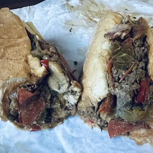 Large Steak and Cheese - Cooked Onion - Cooked Peppers  - Light Ketchup and Mayonnaise  - Pepperoni  - Becon  - Mushroom