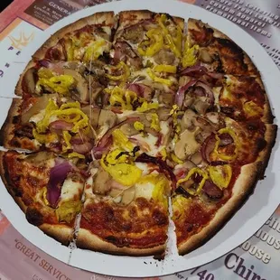 11 Inch Mushroom, Onion, and Banana Pepper Pizza.  Very Good Central Ohio Pizza!  Great Sauce And Crust.