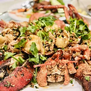 a plate of seafood and salad