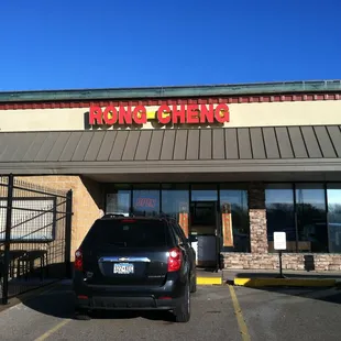 a car parked in front of a store
