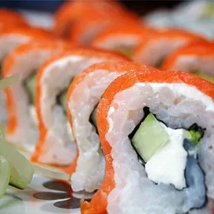 a plate of sushi rolls