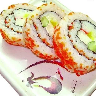 a plate of sushi rolls