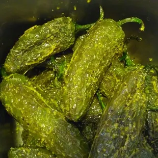These roasted lemon pepper jalapenos are delicious!!  They are in a container near the cash register.
