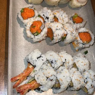Front top to bottom: Cha Cha Roll, Spicy Tuna Roll, Shrimp Tempura Roll