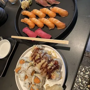 Spicy tuna roll, crunchy roll, tuna nigiri, salmon nigiri, and bonita nigiri