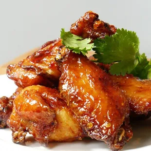 a plate of chicken wings