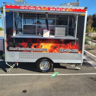 a food truck parked in a parking lot