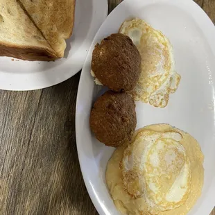 Salmon patties 2 eggs grits and toast