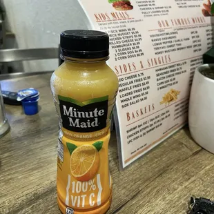 Bottled OJ and menu