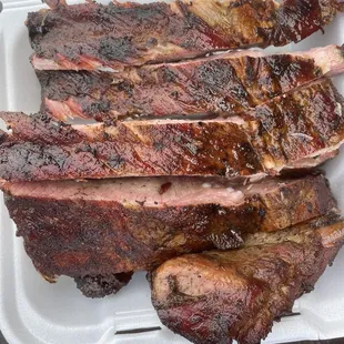 ribs in a styrofoam container