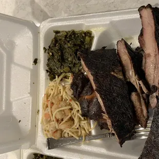 Ribs, chicken, seafood pasta and collard greens.