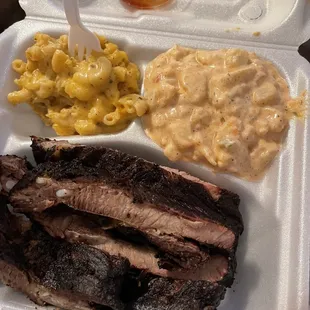 Ribs, potato salad, Mac and cheese, &amp; one of their sauces. Better than crack!