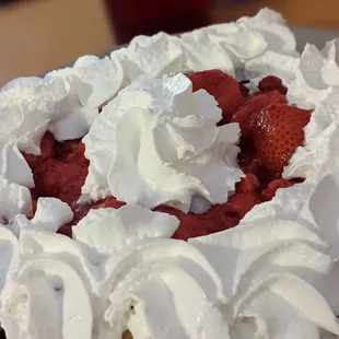 Belgian waffle with strawberries and cream