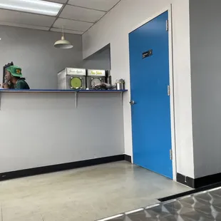 a man standing at a counter