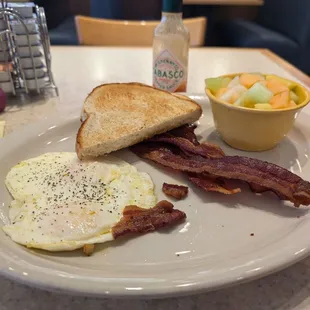 The classic breakfast eggs, bacon, fruit subbed for potatoes