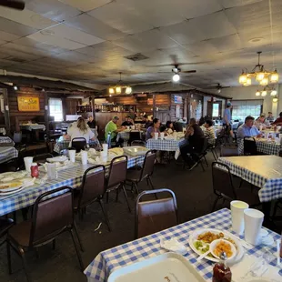 a woman standing in the dining room