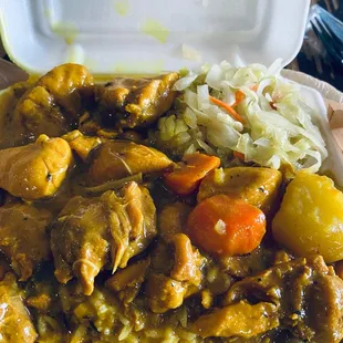 Chicken curry with white rice and cabbage