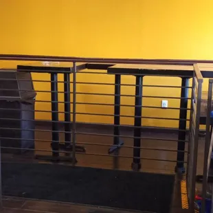 Tables without chairs or stools.