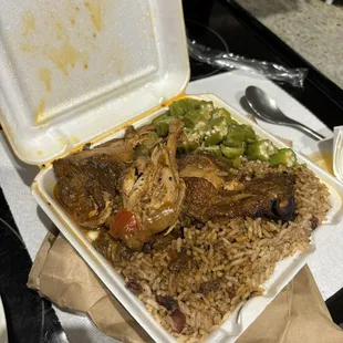 Brown chicken stew with rice and beans and okra. This was their small size which is $10.80 (including tax)