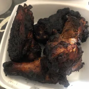 i just grabbed some jerk wings they were the worst wings i ever tatsed never again they was not hot and they were chewy