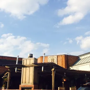 Inconspicuously located on the inside corner of a bustling shopping center. Enjoy this summer on their shaded patio.
