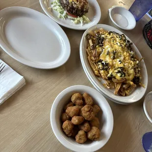Low carb burger, fried mushrooms, and Spanish fries.