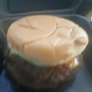 1/2 lb burger to go. Still huge!