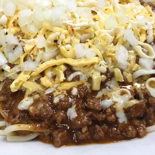 3-Way Chili, spaghetti topped with Rons famous chili. Cheese and onions are optional.