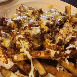 We added chili and cheese to our side of fries.