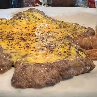 9oz Cheeseburger Steak and toast.